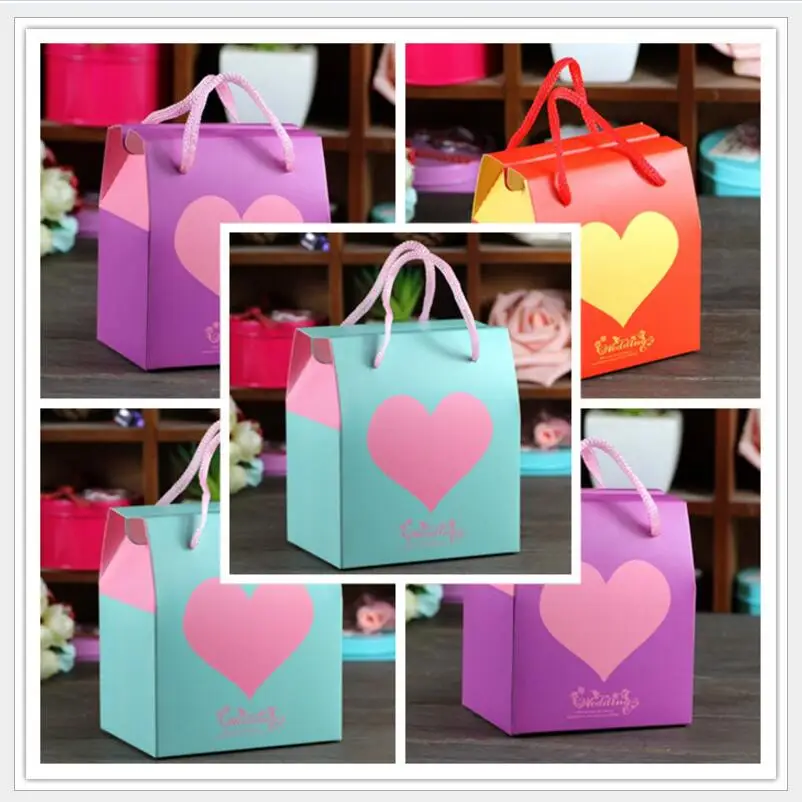 20pcs/lot Heart Print Handbag Wedding Candy Box Party Favor Gift Candy Bag Party Supplies Wedding Decorations
20pcs/lot Heart Print Handbag Wedding Candy Box Party Favor Gift Candy Bag Party Supplies Wedding Decorations