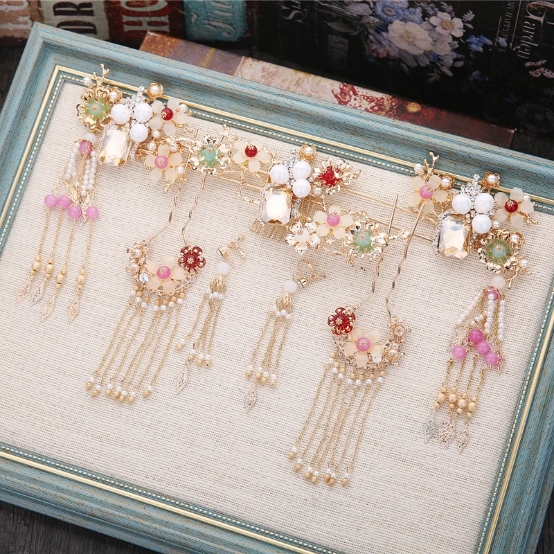 Chinese crystal beads tassle phoenix crown hairpins earrings sets atmosphere wedding hair accessories
Chinese crystal beads tassle phoenix crown hairpins earrings sets atmosphere wedding hair accessories