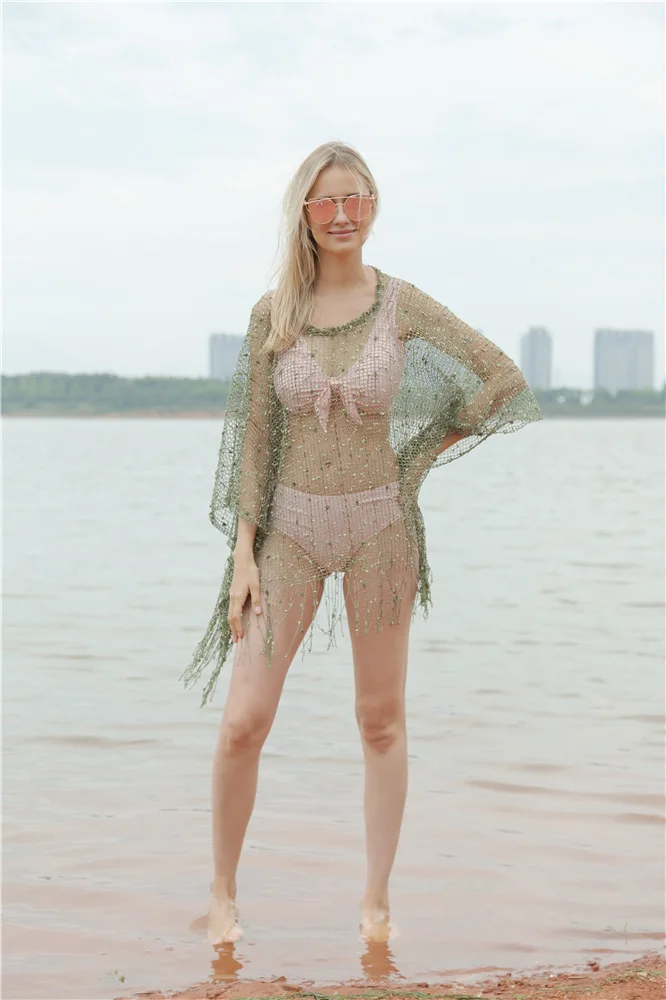 New fashion summer beach sequins, Tassel cloaks, mesh eyes, sexy, hollow bikini tops, sun shawl.
New fashion summer beach sequins, Tassel cloaks, mesh eyes, sexy, hollow bikini tops, sun shawl.
