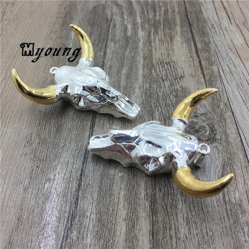 Buffalo Cattle Skull Pendant With Silver & Gold Electroplated Trim, Long Horn Cattle Skull Charm Pendant 45*23 mm MY1497
Buffalo Cattle Skull Pendant With Silver & Gold Electroplated Trim, Long Horn Cattle Skull Charm Pendant 45*23 mm MY1497