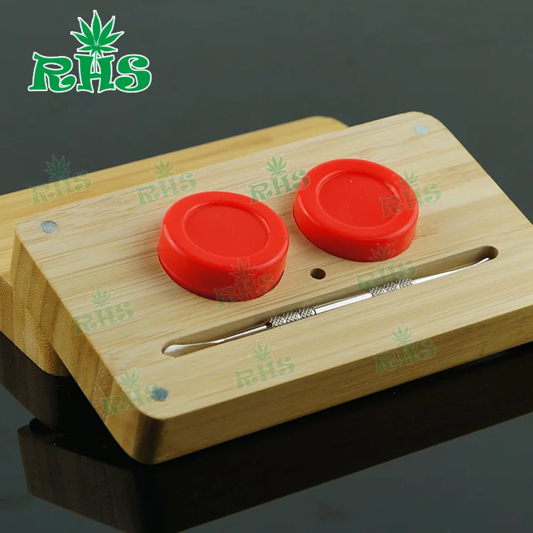 Hot selling FDA approved non stick small silicone container for wax with bamboo tray dab oil silicone jars dab wax container2set
Hot selling FDA approved non stick small silicone container for wax with bamboo tray dab oil silicone jars dab wax container2set