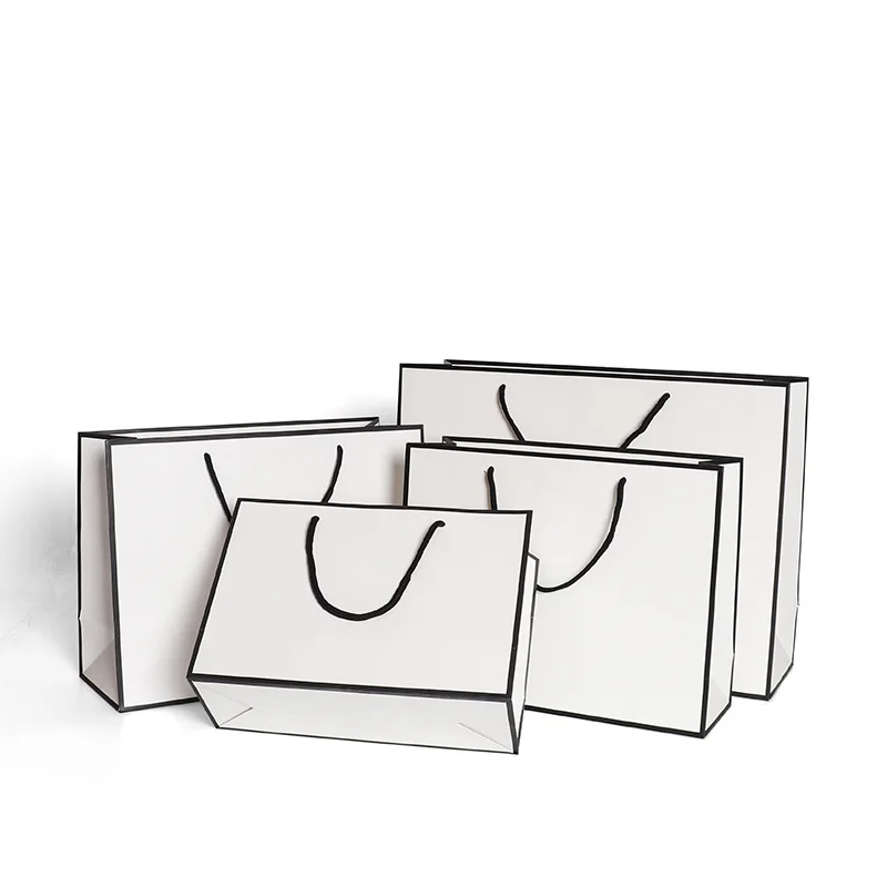 10 pcs Large White Kraft Paper Packaging Bag, Garment Gift Paper Bag with Handles, Small Black Paper Shopping Bag 
10 pcs Large White Kraft Paper Packaging Bag, Garment Gift Paper Bag with Handles, Small Black Paper Shopping Bag