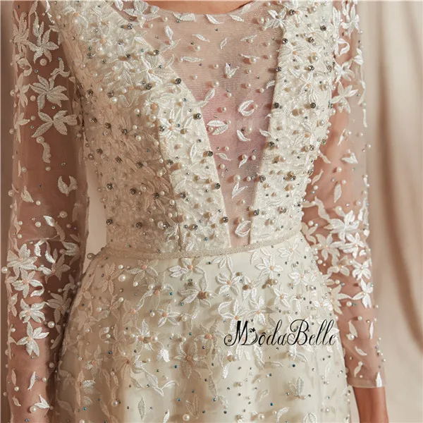 modabelle Ivory Arabic Wedding Dress Robe Mariee Dentelle Long Sleeves Lace Pearls A-line Wedding Ball Gowns Robe Mariage 2019
modabelle Ivory Arabic Wedding Dress Robe Mariee Dentelle Long Sleeves Lace Pearls A-line Wedding Ball Gowns Robe Mariage 2019