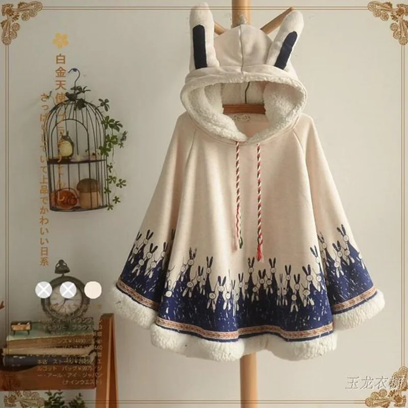Women Winter Warm Cloak Harajuku Style Japanese Mori Girls Cartoon Neko Atsume Rabbit Ear Loose Cape Thick Hoodie Casual Tops
Women Winter Warm Cloak Harajuku Style Japanese Mori Girls Cartoon Neko Atsume Rabbit Ear Loose Cape Thick Hoodie Casual Tops