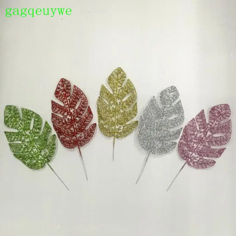 30pcs Palm Leaves Monstera with Gold powder blade Christmas Artificial leaves Simulation leaves Christmas decorations 35x14cm
30pcs Palm Leaves Monstera with Gold powder blade Christmas Artificial leaves Simulation leaves Christmas decorations 35x14cm