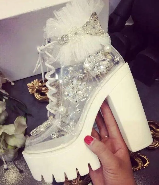 Elegant White Lace Clear PVC Ankle Boots Lace-up Crystal Pearl Decor Chunky Heels Ladies Runway Boots High Platform Shoes
Elegant White Lace Clear PVC Ankle Boots Lace-up Crystal Pearl Decor Chunky Heels Ladies Runway Boots High Platform Shoes