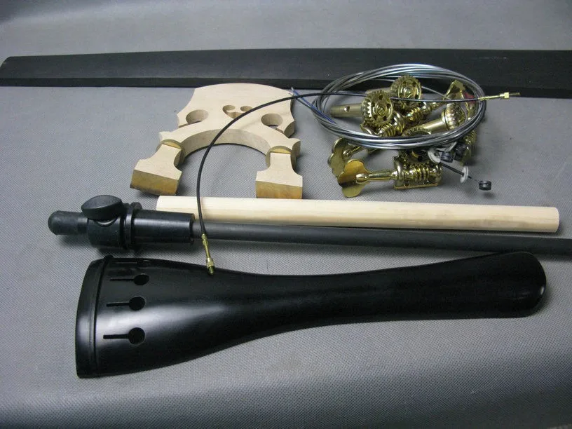 one set bass parts,3/4 Upright bass fingerboard/:bridge/tailpiece/sound post etc Price:
one set bass parts,3/4 Upright bass fingerboard/:bridge/tailpiece/sound post etc Price:
