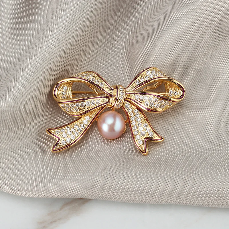 Luxury Crystal Gold Bowknot Brooches Women Natural Pearl Rhinestone Flower Brooch Pins Accessories Jewelry for Wedding Party
Luxury Crystal Gold Bowknot Brooches Women Natural Pearl Rhinestone Flower Brooch Pins Accessories Jewelry for Wedding Party