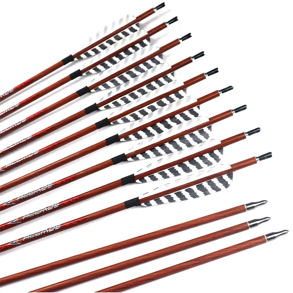 12pc 32 inch Wood Skin Carbon Arrows Spine 400 450 500 550 600 700 With 4" Real Feather for Longbow Recurve Bow Hunting
12pc 32 inch Wood Skin Carbon Arrows Spine 400 450 500 550 600 700 With 4" Real Feather for Longbow Recurve Bow Hunting