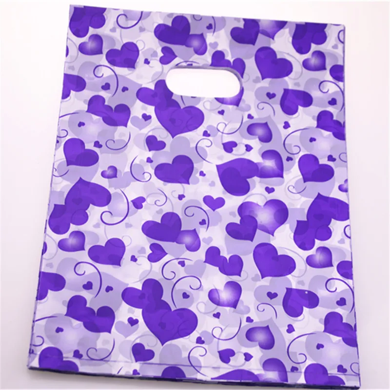 New Design Wholesale 100pcs/lot 25*35cm Luxury Wedding Gift Packaging with Handles Heart Shape Plastic Shopping Bags
New Design Wholesale 100pcs/lot 25*35cm Luxury Wedding Gift Packaging with Handles Heart Shape Plastic Shopping Bags