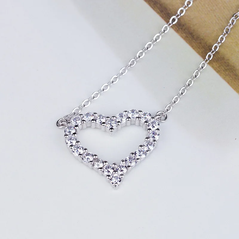 FENGLI Vintage Crystal Heart Pendant Necklace Transparent CZ Crystal Necklaces for Women Geometric Statement Jewelry
FENGLI Vintage Crystal Heart Pendant Necklace Transparent CZ Crystal Necklaces for Women Geometric Statement Jewelry