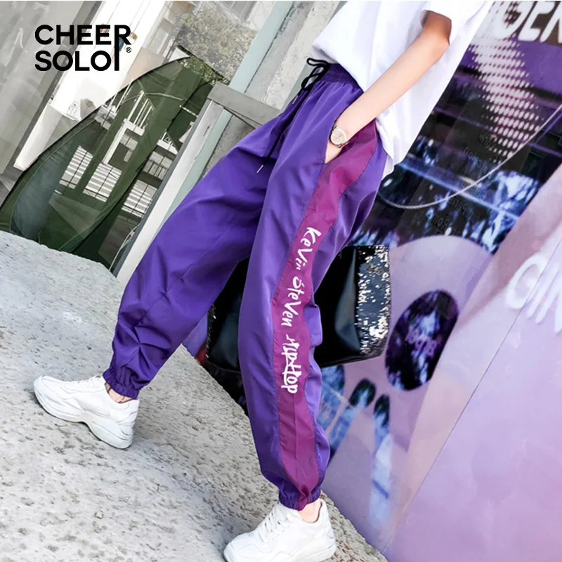 CheerSolo Hip Hop Loose Pants Women Harajuku Purple Sweatpants Side Striped Letter Print Black Trousers Street Style
CheerSolo Hip Hop Loose Pants Women Harajuku Purple Sweatpants Side Striped Letter Print Black Trousers Street Style