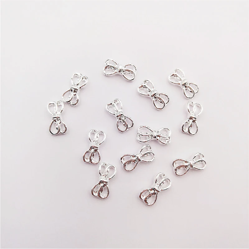 50 PCS/bag Nail Decoration Sticker 3D Hollow Double Bow Shape Shiny Manicure Charm Alloy Nails Charms For Manicure Decoration
50 PCS/bag Nail Decoration Sticker 3D Hollow Double Bow Shape Shiny Manicure Charm Alloy Nails Charms For Manicure Decoration