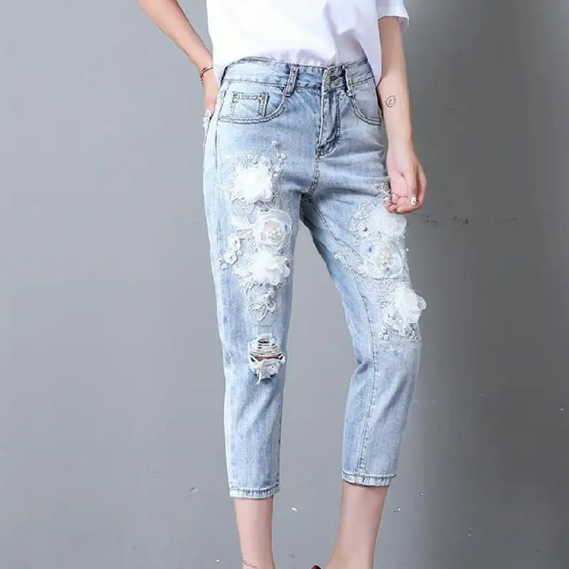 Female Pencil pants stereoscopic flower embroidery Do the old jeans natural waist personality thin button seven pants jeans wome
Female Pencil pants stereoscopic flower embroidery Do the old jeans natural waist personality thin button seven pants jeans wome