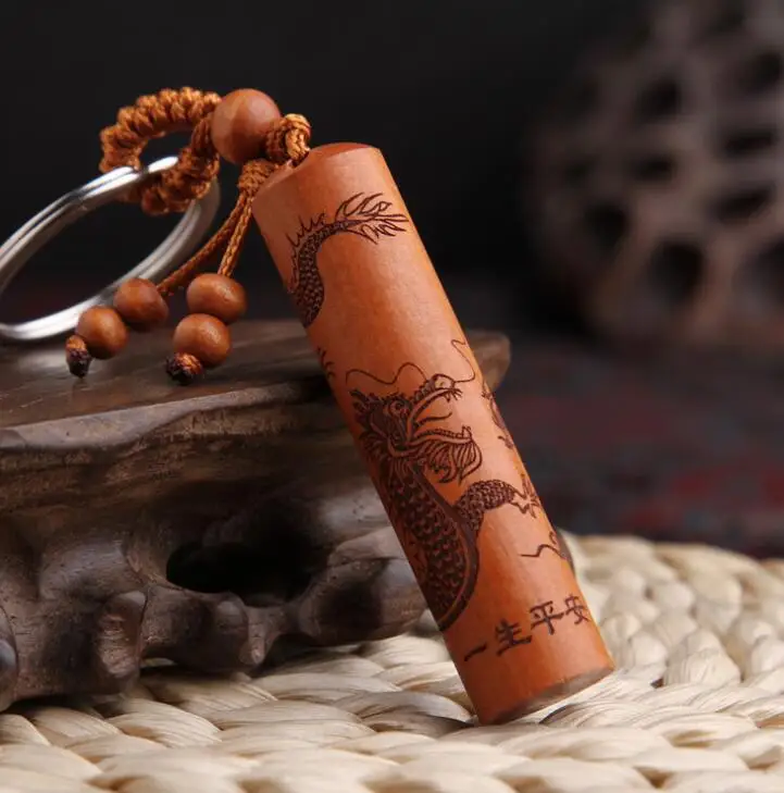 Chinese Peach Wood Carved Cylinder Pendant Safe And Good Luck Word Twelve Zodiac Animal Dragon Exquisite Car Key Chain Pendant 
Chinese Peach Wood Carved Cylinder Pendant Safe And Good Luck Word Twelve Zodiac Animal Dragon Exquisite Car Key Chain Pendant