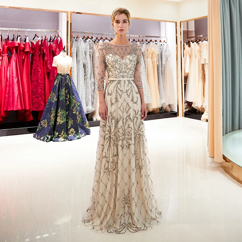 Charming A-line Vestido Prom Dresses Illusion Three Quarter Length Sleeves Sequins Beading Champagne Formal Party Dresses
Charming A-line Vestido Prom Dresses Illusion Three Quarter Length Sleeves Sequins Beading Champagne Formal Party Dresses