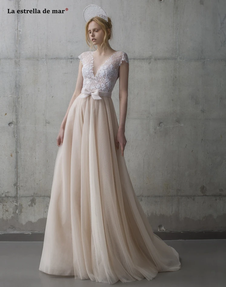 Vestido novia new lace tulle sexy V neck short sleeve ALine champagne boho wedding trailing ball gown wedding dresses
Vestido novia new lace tulle sexy V neck short sleeve ALine champagne boho wedding trailing ball gown wedding dresses