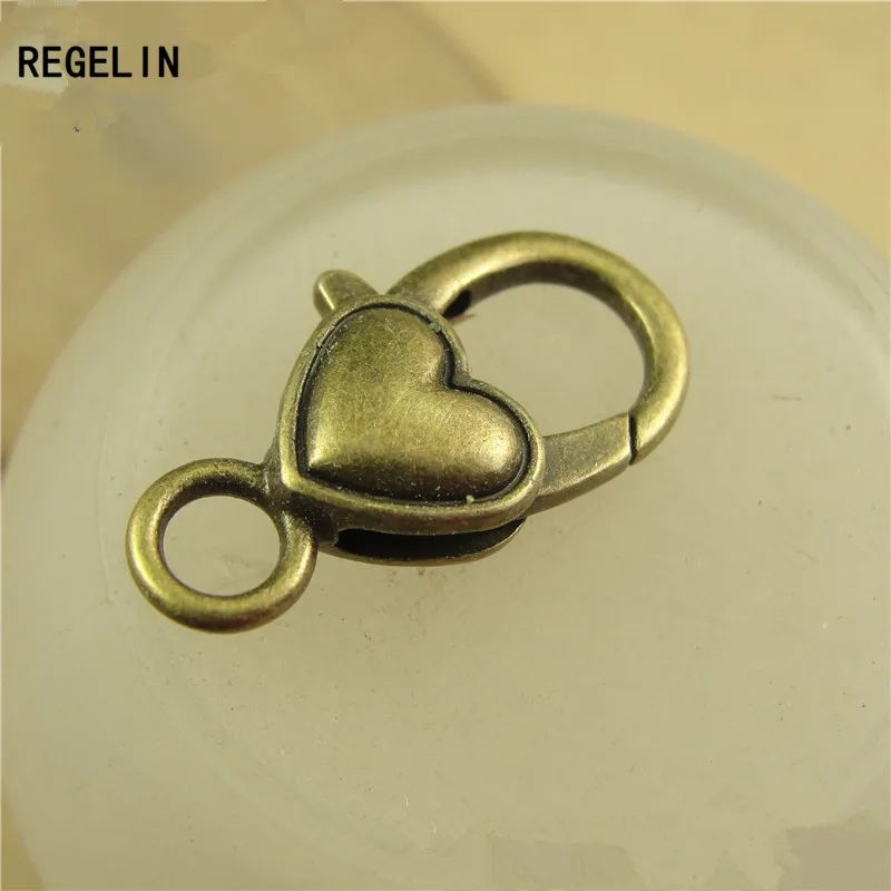 REGELIN 10 шт./лот античное Серебряное сердце застежка-карабин крючки для ожерелья браслета цепи DIY Ювелирные изделия Аксессуары 27*14 мм
REGELIN 10 шт./лот античное Серебряное сердце застежка-карабин крючки для ожерелья браслета цепи DIY Ювелирные изделия Аксессуары 27*14 мм