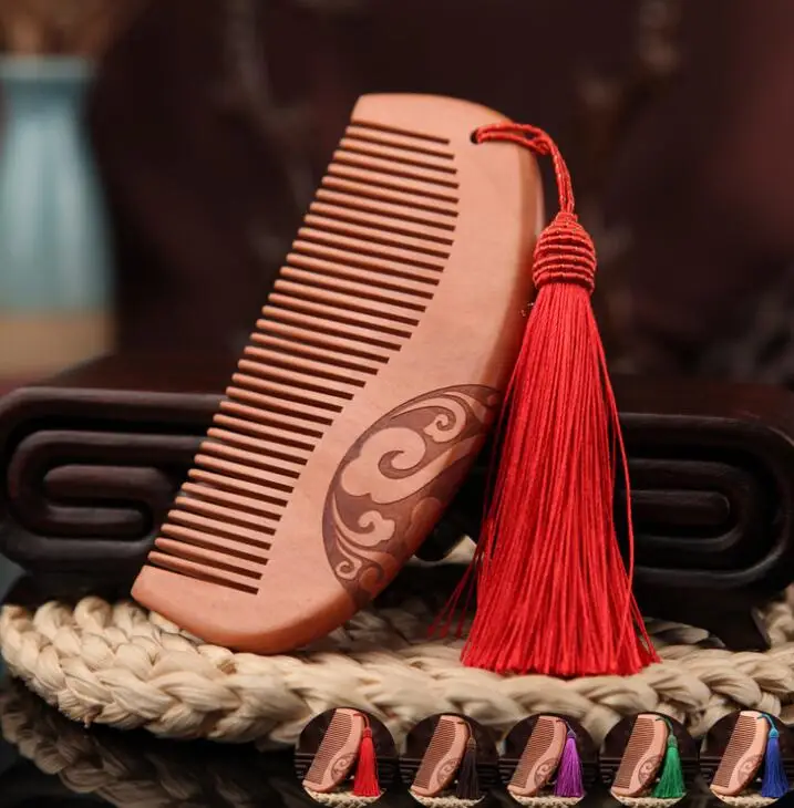 Chinese Peach Wood Two-sided Carved Auspicious Clouds Five Colors Tassels Solid Wood Comb
Chinese Peach Wood Two-sided Carved Auspicious Clouds Five Colors Tassels Solid Wood Comb