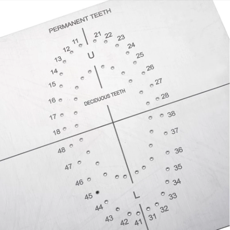 1PCS Stainless Steel Dental Rubber Dam Punch Hole Board Barrier Positioning Template With Scale Clinic Lab Instrument Tool
1PCS Stainless Steel Dental Rubber Dam Punch Hole Board Barrier Positioning Template With Scale Clinic Lab Instrument Tool