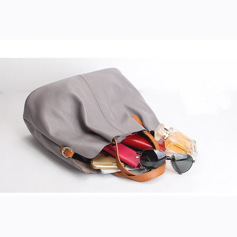Leather female bag 2021 new fashion first layer leather slung portable child mother bag Guangzhou factory direct sales
Leather female bag 2021 new fashion first layer leather slung portable child mother bag Guangzhou factory direct sales