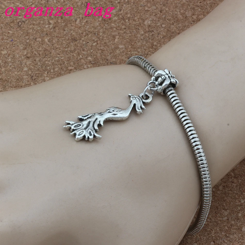 100pcs/lot Dangle Zinc alloy Phoenix Bird Charm Big Hole Beads Fit European Charm Bracelet Jewelry 11.5x44mm A-252a
100pcs/lot Dangle Zinc alloy Phoenix Bird Charm Big Hole Beads Fit European Charm Bracelet Jewelry 11.5x44mm A-252a