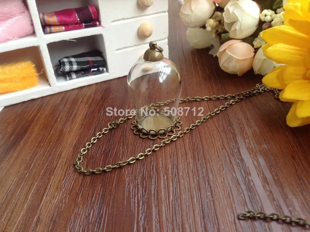 20Sets 30mmx18mm opening clear glass globe necklace pendant, wish pendant, come with bronze cap,free 70cm necklace chain
20Sets 30mmx18mm opening clear glass globe necklace pendant, wish pendant, come with bronze cap,free 70cm necklace chain