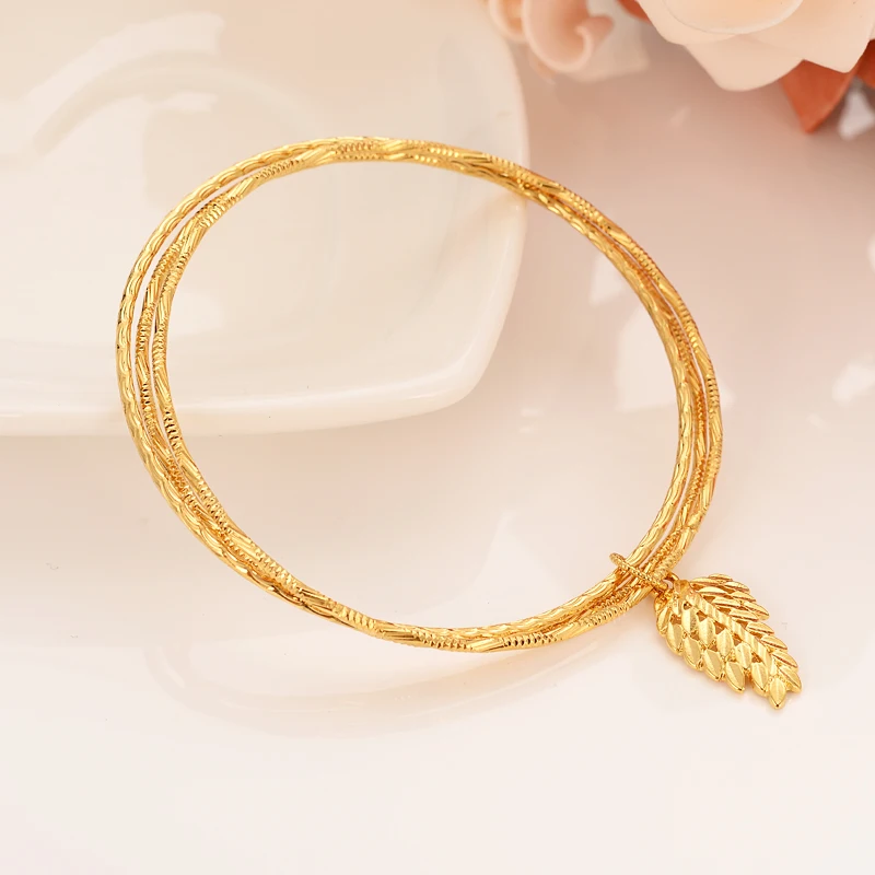 New Arrival Gold color Luxury Brand Bangle african leaf pendant Women Bijoux Fashion Jewelry Charm Bracelets Bangles Set Pulser
New Arrival Gold color Luxury Brand Bangle african leaf pendant Women Bijoux Fashion Jewelry Charm Bracelets Bangles Set Pulser