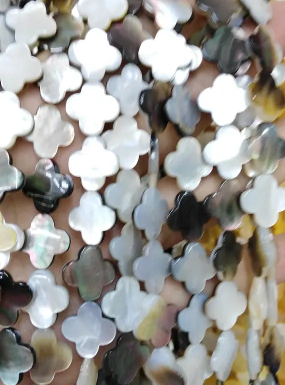 Shell Clover bead wholeasale 2strands 8-12mm Genuine MOP Shell ,Pearl Shell clover florial white black yellow pink red jewelry b
Shell Clover bead wholeasale 2strands 8-12mm Genuine MOP Shell ,Pearl Shell clover florial white black yellow pink red jewelry b