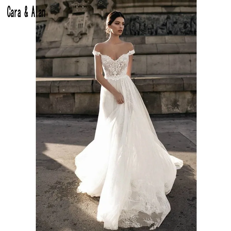 Brand Designer Beach Wedding Dresses Backless Sweep Train Long Bridal Gowns Off the Shoulder Vestido De Noiva
Brand Designer Beach Wedding Dresses Backless Sweep Train Long Bridal Gowns Off the Shoulder Vestido De Noiva