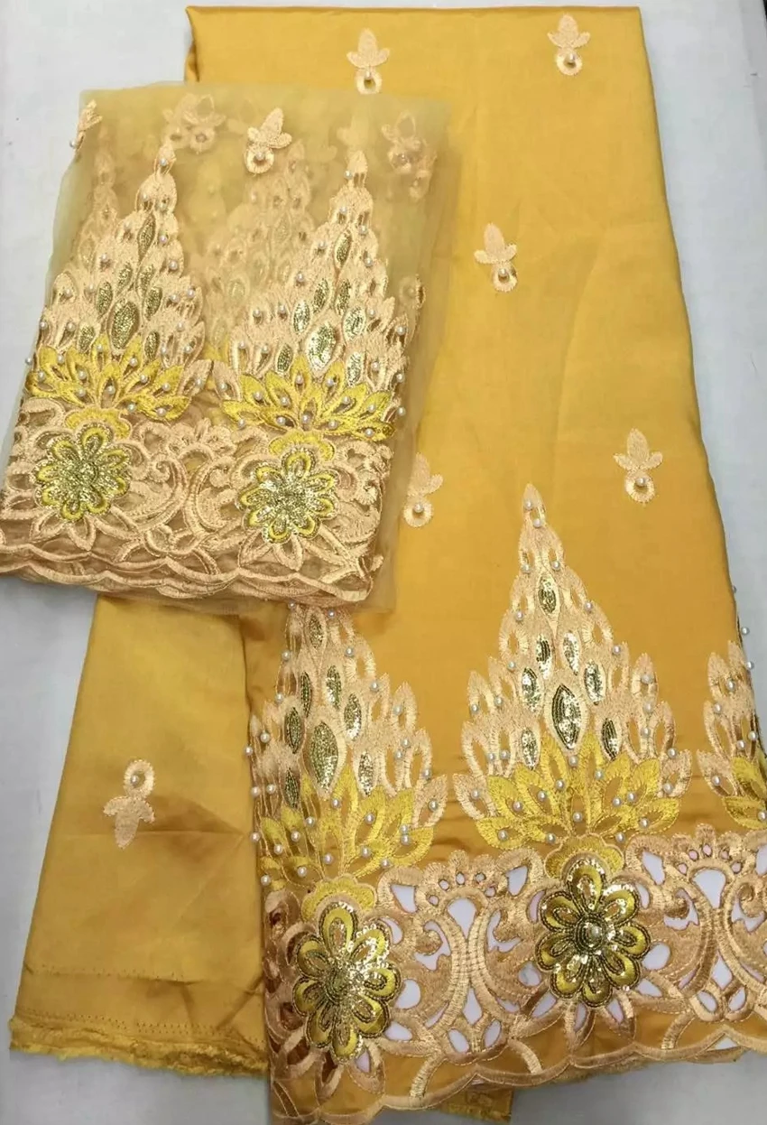 5yards African George Fabric with 2yards French net lace yellow embroidered bridal sequin beads for Nigerian women dress
5yards African George Fabric with 2yards French net lace yellow embroidered bridal sequin beads for Nigerian women dress