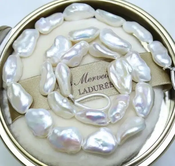 12-15 mm white pearl necklace 18" 35" 50"
12-15 mm white pearl necklace 18" 35" 50"