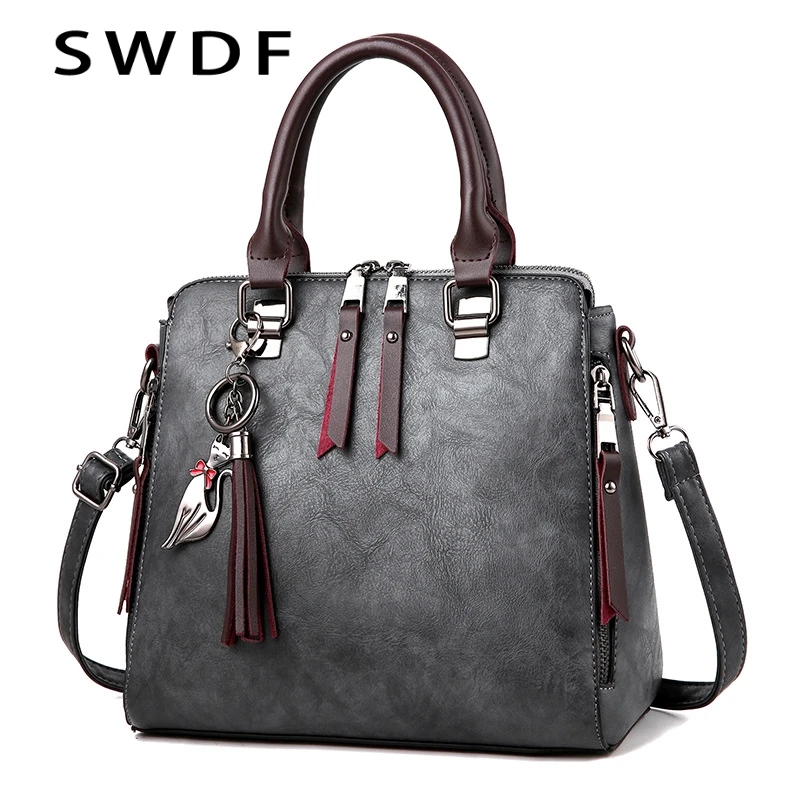 Vintage PU Leather Ladies HandBags Women Messenger Bags TotesTassel Designer Crossbody Shoulder Bag Boston Hand Bags Hot Sale
Vintage PU Leather Ladies HandBags Women Messenger Bags TotesTassel Designer Crossbody Shoulder Bag Boston Hand Bags Hot Sale