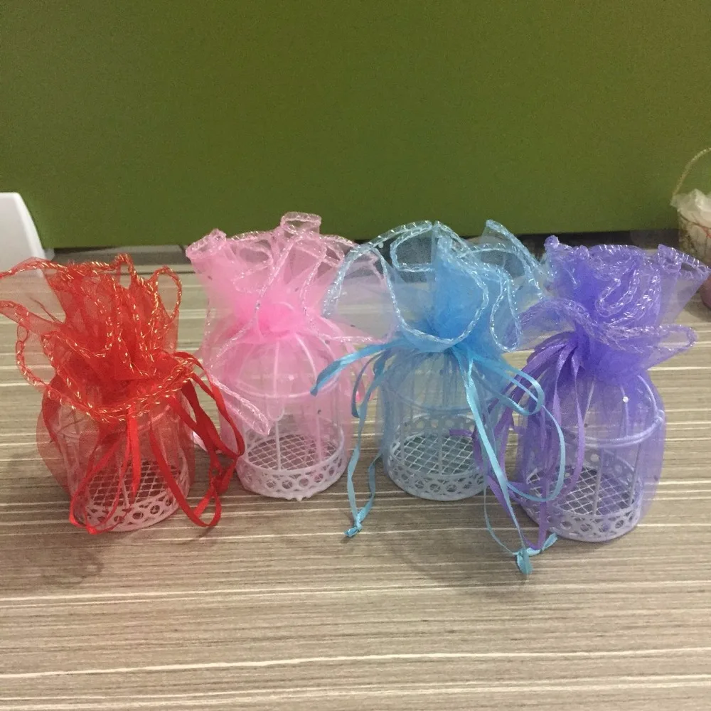 Creative wedding and party candy boxes European iron bird cage gift boxes white flip cage personalized wedding candy bags
Creative wedding and party candy boxes European iron bird cage gift boxes white flip cage personalized wedding candy bags