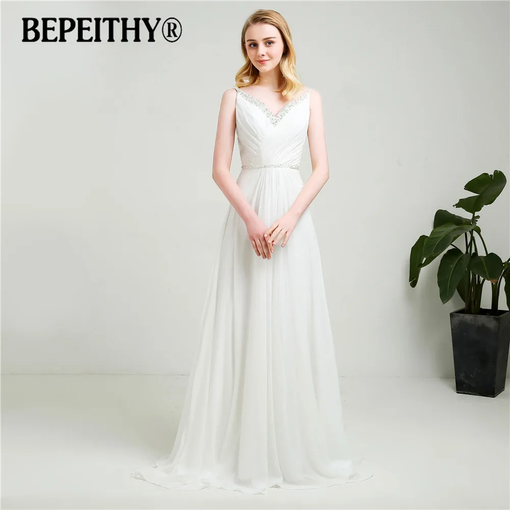 New Style Beach Wedding Dress Court Train 2021 Vestido De Novia V-Neck Sexy Backless Chiffon Bridal Dresses With Beads
New Style Beach Wedding Dress Court Train 2021 Vestido De Novia V-Neck Sexy Backless Chiffon Bridal Dresses With Beads