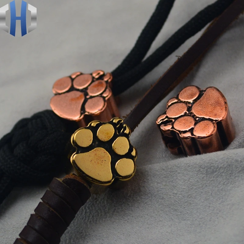 Steel Flame Paw Brass Fire Dog Paw Print Brass Knife Pendant Umbrella Rope Pendant Copper EDC Rope Pendant Knife Beads
Steel Flame Paw Brass Fire Dog Paw Print Brass Knife Pendant Umbrella Rope Pendant Copper EDC Rope Pendant Knife Beads