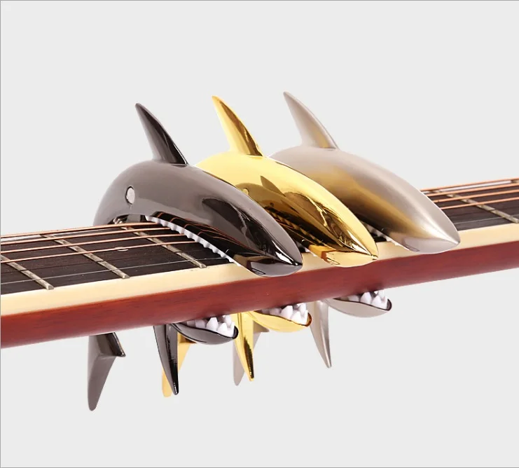 Shark Guitar Capo Zinc Alloy Universal Quick Change Clamp For Acoustic Classic Electric Guitarra Musical Instrument Accessories
Shark Guitar Capo Zinc Alloy Universal Quick Change Clamp For Acoustic Classic Electric Guitarra Musical Instrument Accessories