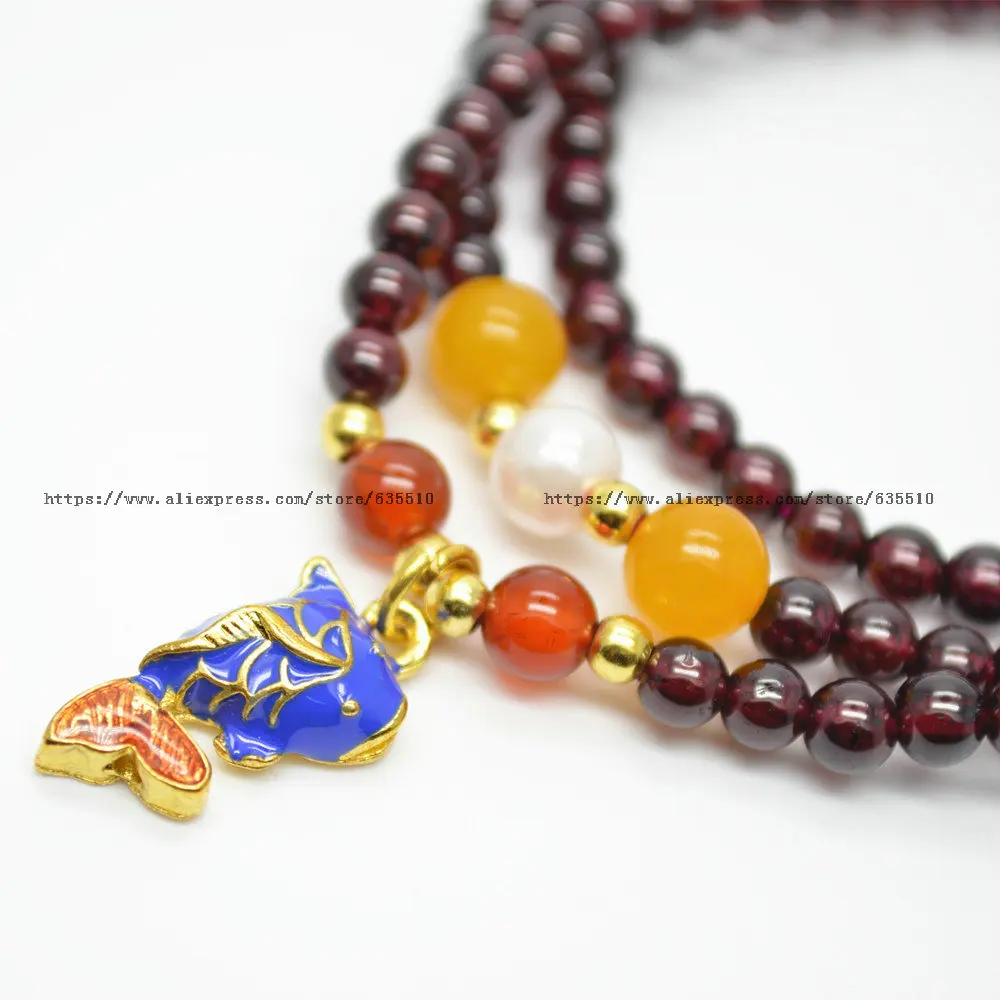 Wholesale Cute cloisonne Fish Charm Multi Rows Natural Garnet Round Beads Bracelet Elastic Line Fashion Woman Jewelry Gift
Wholesale Cute cloisonne Fish Charm Multi Rows Natural Garnet Round Beads Bracelet Elastic Line Fashion Woman Jewelry Gift