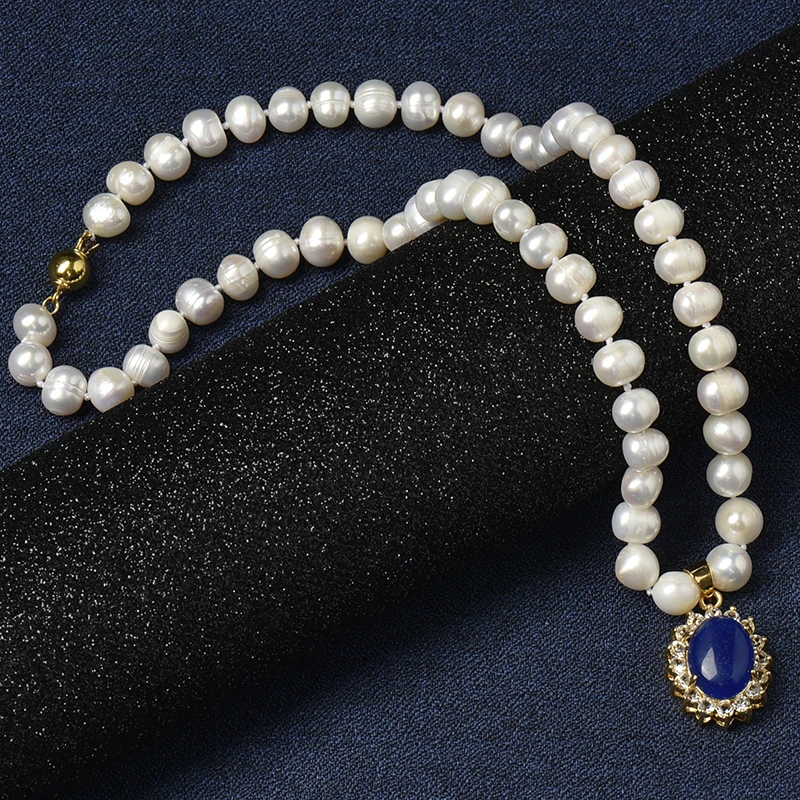 

8-9 mm Freshwater Natural Pearl Necklace With delicate elliptical pearls and a sapphire blue elliptical 19*23*10 mm pendant