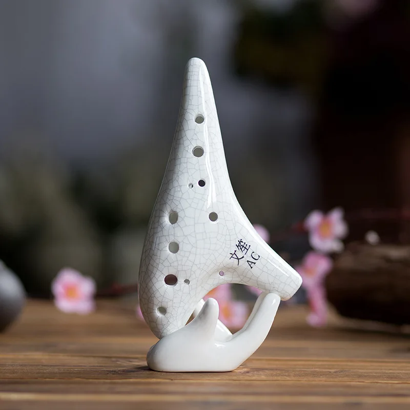 Wisteria pattern The new alto C 12 hole ocarina Paint crack professional ocarina Welcome wholesale and custom-made
Wisteria pattern The new alto C 12 hole ocarina Paint crack professional ocarina Welcome wholesale and custom-made