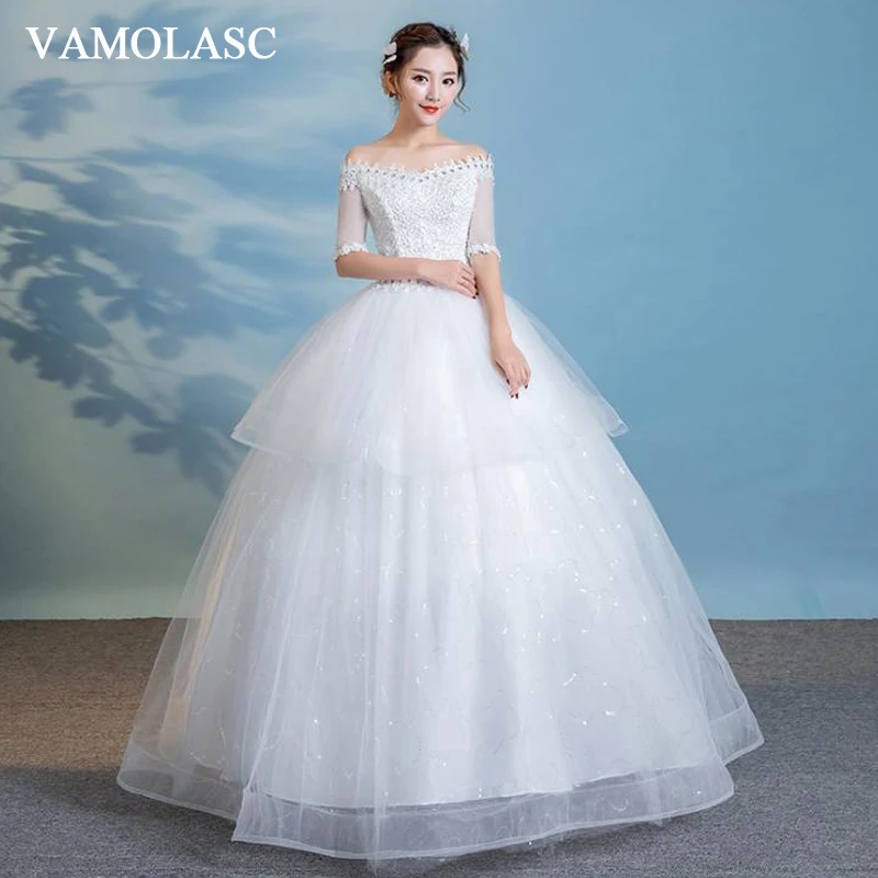 VAMOLASC Crystal Boat Neck Tiered Lace Ball Gown Wedding Dresses Illusion Pearls Half Sleeve Backless Bridal Gowns
VAMOLASC Crystal Boat Neck Tiered Lace Ball Gown Wedding Dresses Illusion Pearls Half Sleeve Backless Bridal Gowns