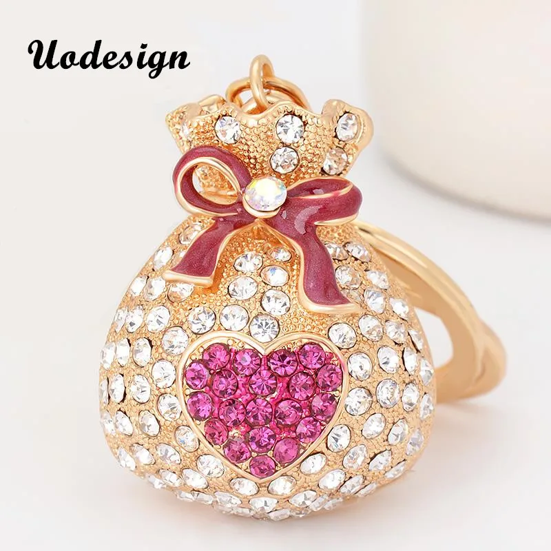 Uodesign Trendy New Gift Cute Bling Rhinestone Lucky Bag Keychain Car Love Bow Key Chain Ring Pendant For Bag Charm Hotsale
Uodesign Trendy New Gift Cute Bling Rhinestone Lucky Bag Keychain Car Love Bow Key Chain Ring Pendant For Bag Charm Hotsale