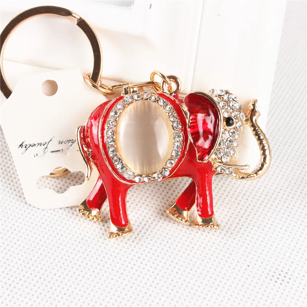 Lovely Elephant Oval Opal Crystal Rhinestone Charm Pendant Purse HandBag Key Ring Chain Creative Party Gift Accessories
Lovely Elephant Oval Opal Crystal Rhinestone Charm Pendant Purse HandBag Key Ring Chain Creative Party Gift Accessories