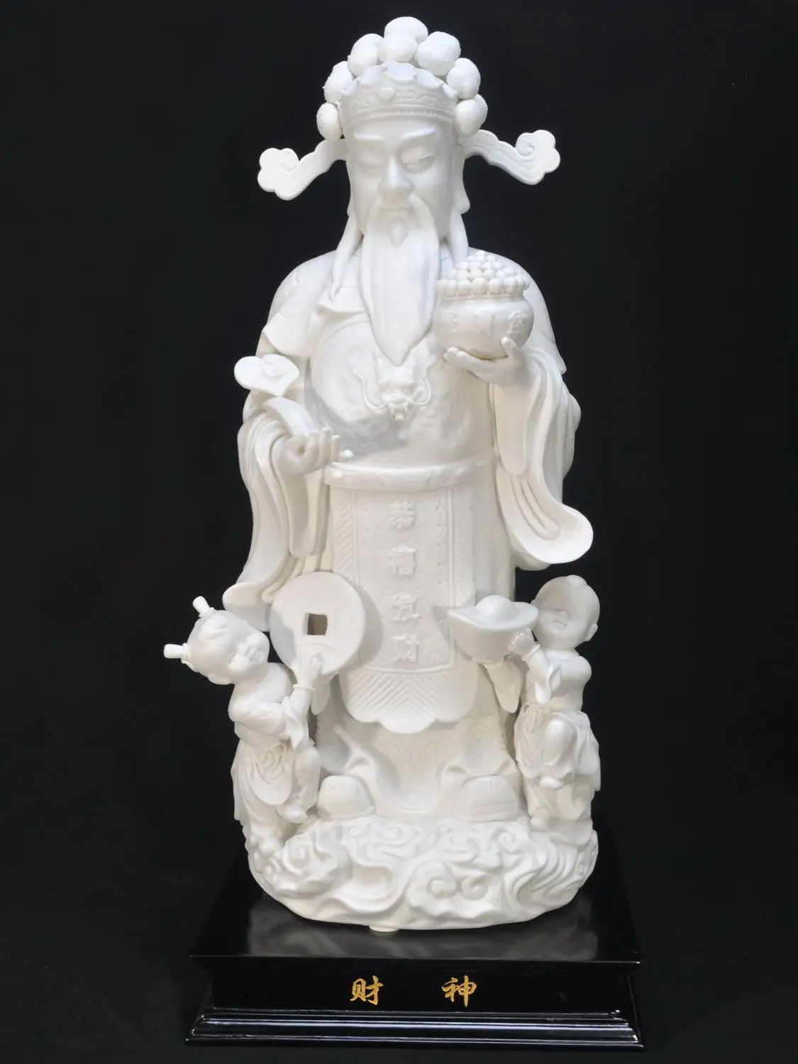 Dehua ceramic boy worship Mammon Buddha feng shui ornaments large opening felicitous wish of making money.
Dehua ceramic boy worship Mammon Buddha feng shui ornaments large opening felicitous wish of making money.