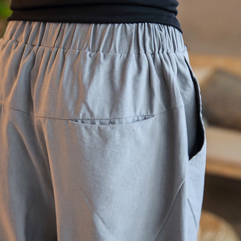 Chinese style splicing elastic waist drawstring jogger pants loose men's trousers summer new linen men casual calf length pants
Chinese style splicing elastic waist drawstring jogger pants loose men's trousers summer new linen men casual calf length pants