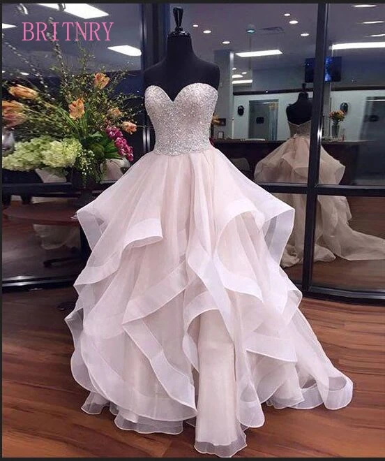 Vestido de noiva Милое Свадебное Платье Многоуровневая органза линия Плюс Размер украшенное бисером свадебное платье
Vestido de noiva Милое Свадебное Платье Многоуровневая органза линия Плюс Размер украшенное бисером свадебное платье