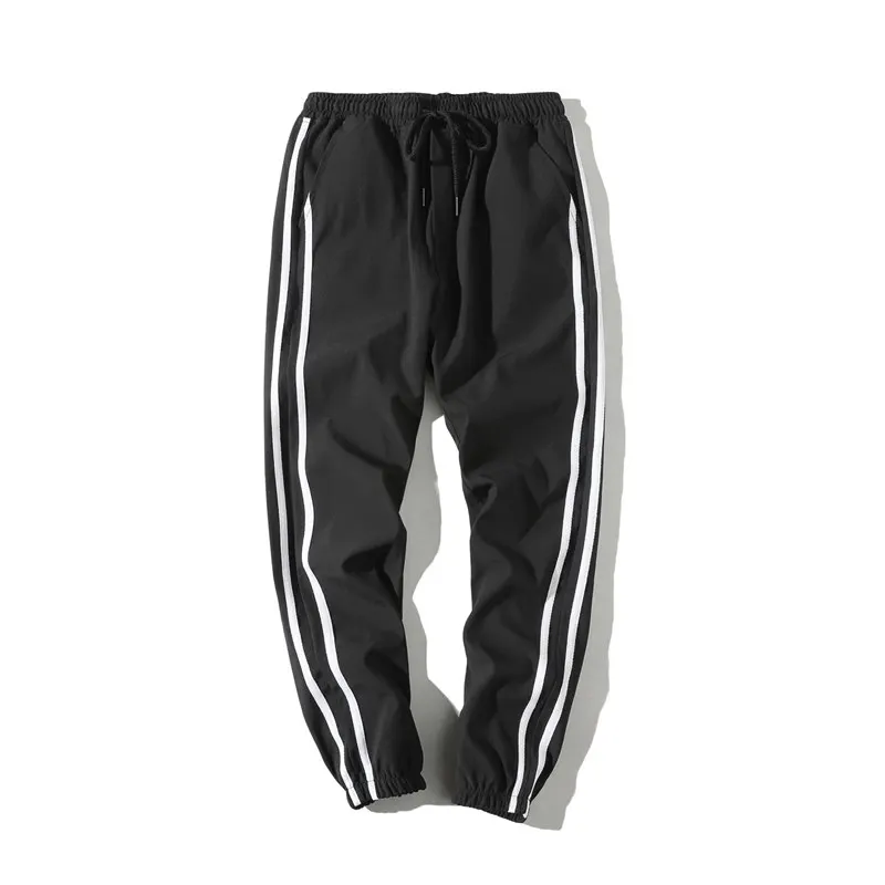 Hot sale summer Plus Size Hip Hop Harem Pants stripe Men Casual Loose Trousers Drawstring Joggers Black M-5XL
Hot sale summer Plus Size Hip Hop Harem Pants stripe Men Casual Loose Trousers Drawstring Joggers Black M-5XL