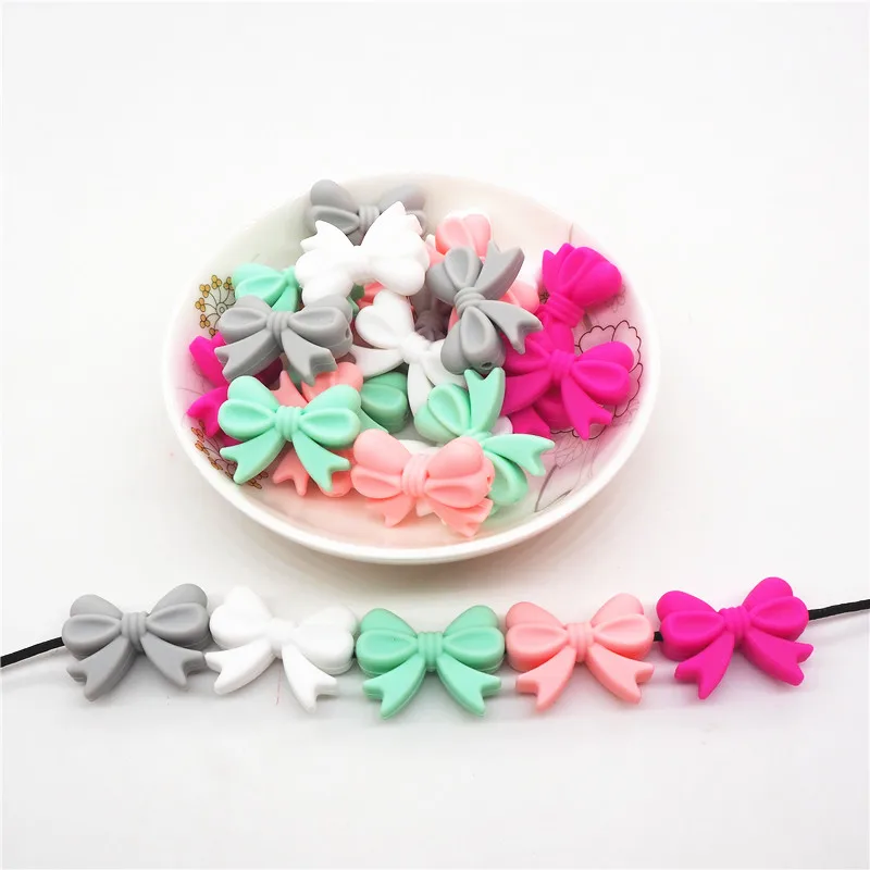 Chenkai 10pcs BPA Free Silicone Bow Tie Teether Beads DIY Baby Animal Teething Montessori Sensory Jewelry Toy Bow-Knot Bead
Chenkai 10pcs BPA Free Silicone Bow Tie Teether Beads DIY Baby Animal Teething Montessori Sensory Jewelry Toy Bow-Knot Bead