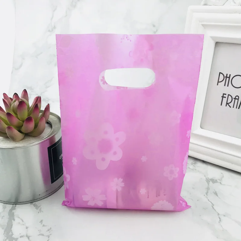 100pcs 15x20cm Pink Flower Plastic Gift Bag With Handles Mini Cute Plastic Boutique Gift Shopping Handle Bags
100pcs 15x20cm Pink Flower Plastic Gift Bag With Handles Mini Cute Plastic Boutique Gift Shopping Handle Bags