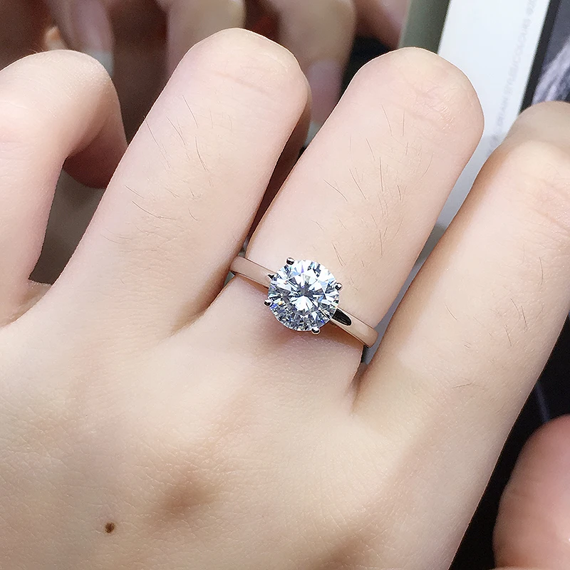 Solid 18K White Gold Round Brilliant Cut 1 ct Moissanite 4 Prong Ring Lab Diamond Engagement Solarite Ring For Women
Solid 18K White Gold Round Brilliant Cut 1 ct Moissanite 4 Prong Ring Lab Diamond Engagement Solarite Ring For Women